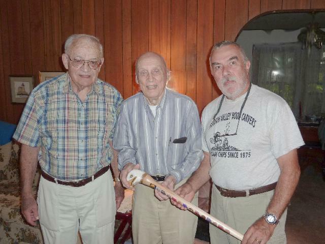 Army Burton J Whitaker Jr. Cane carved by Joe Gleeson of HVWC. Left Harold Feroe (WWII friend), Burton Whitaker, Jr, and Carver Joe Gleeson.