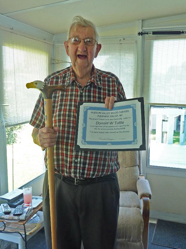 Navy Donald Tuttle, Cane carved by Clay Brooks of HVWC.