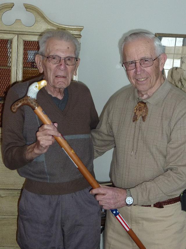 Army Harold P Gilbert. Cane carved by Hal Weisel of HVWC. Presented by Hal Weisel (right) of HVWC.