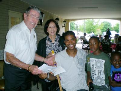Army Spc Jelani Lucas. Cane carved by Frank Bottego of HVWC. Presented by Maj Vic Hugo.