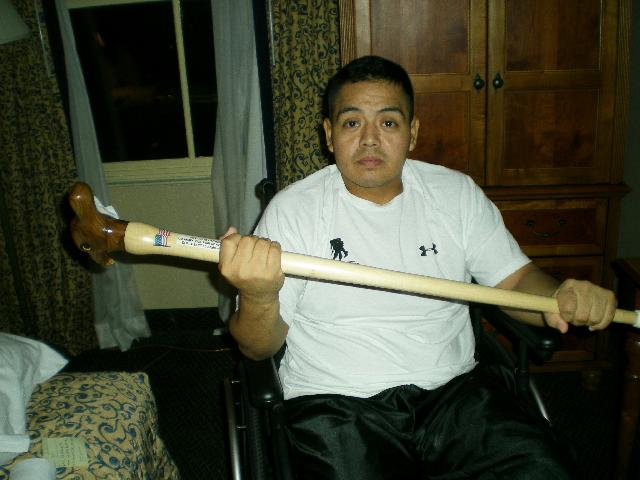 Army Sgt Julio Larrea. Cane carved by Earnest D'Alessandro of MVA&WA.