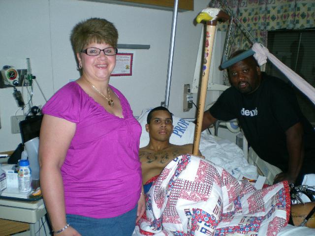 Marine LCpl Kyle Francis-Williams. Cane carved by Mike Febbie of MVA&WA.