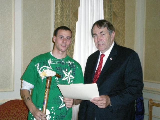 Carver Mike Febbie of MVA&WA for Army PFC Gilad Afridonidze presented by Col Dorsey.