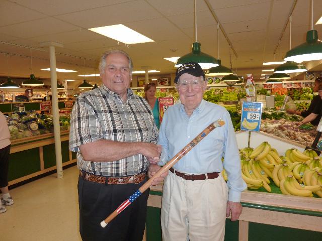 AAF 2nd Lt Ralpha Adams (right). Presented by Pat Paraggio of HVWC. Cane carved by Hal Weisel of HVWC.