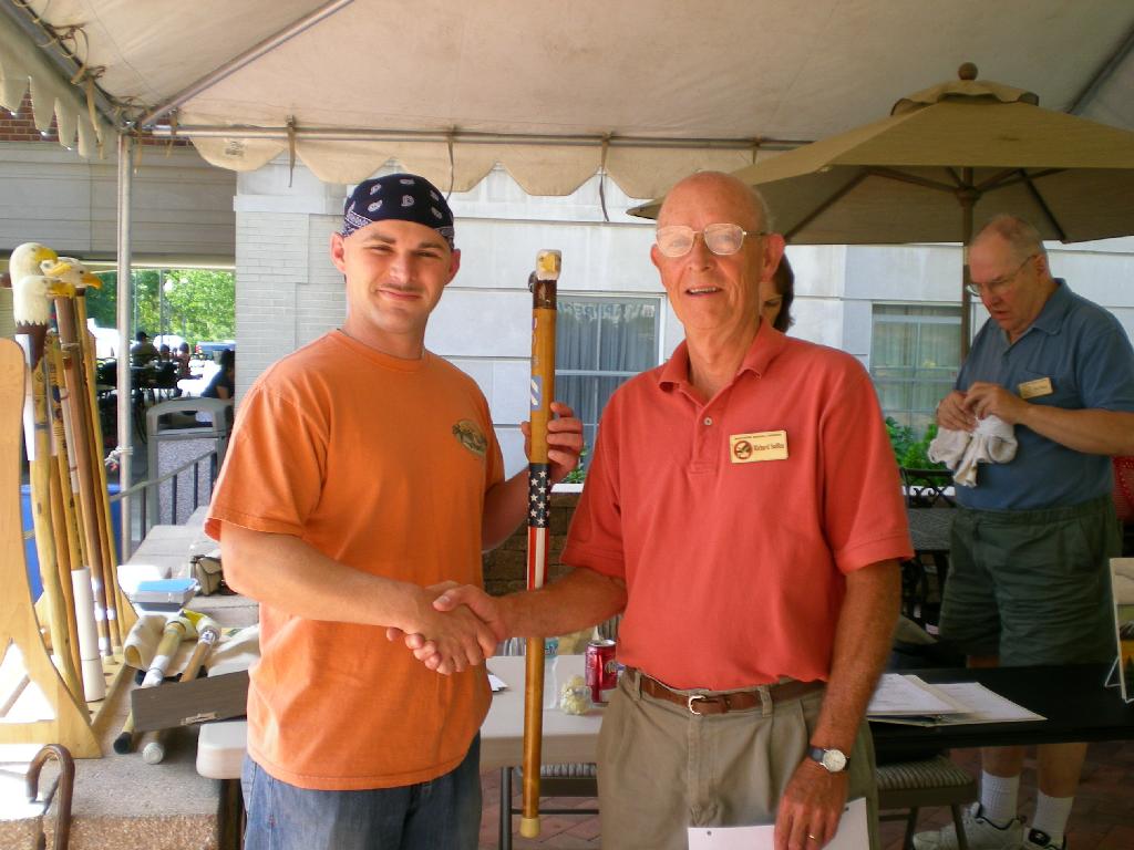 Army SGT Grant Combs presented by COL Sniffen. Cane by Hal Weisel of HVWC.