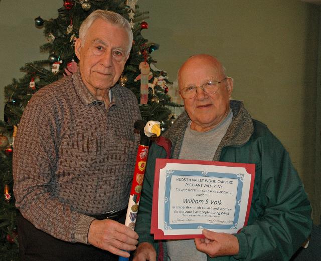 Marine PFC1st William S Volk. Presented by Joe Palmeri. Cane carved by Jim Mullen of HVWC.